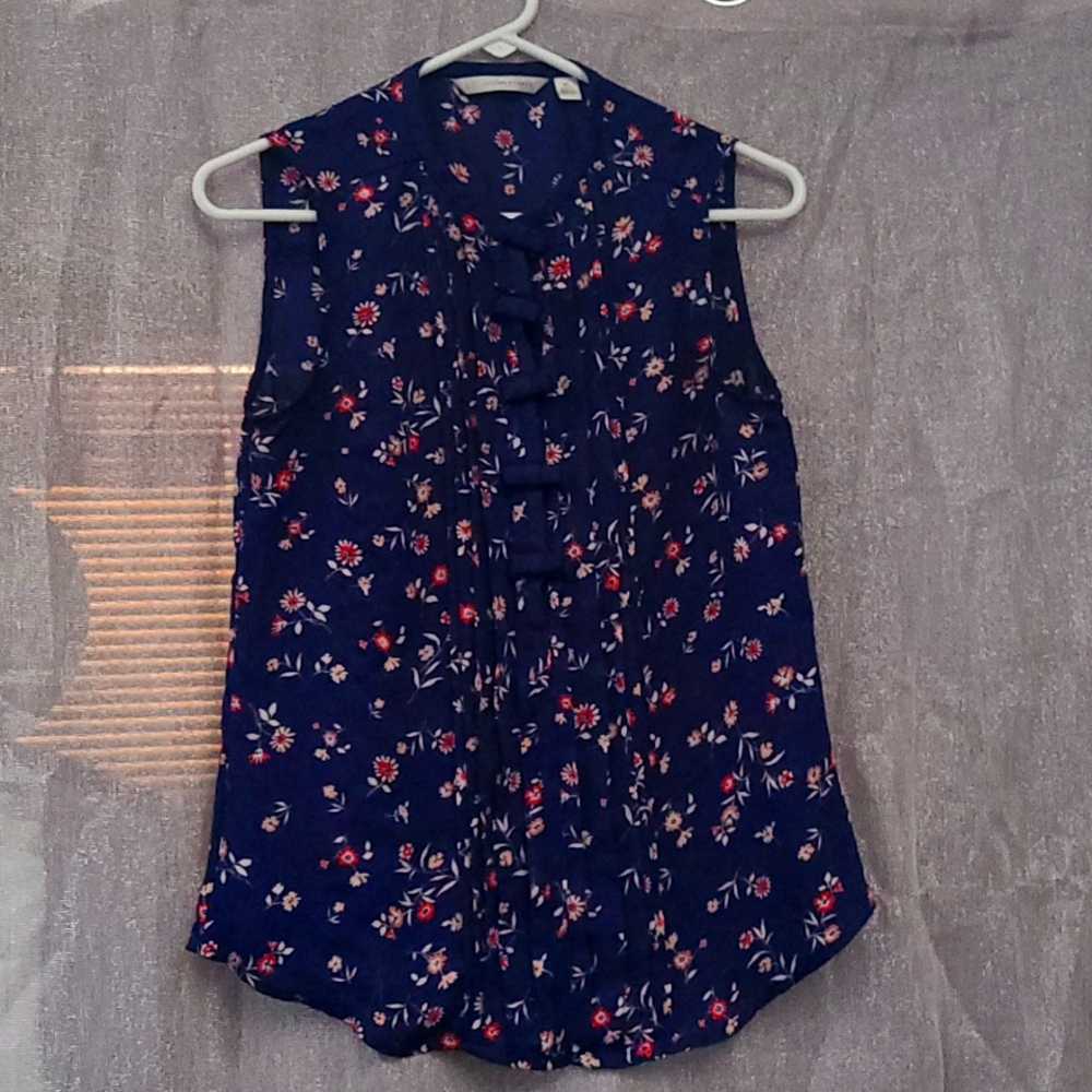 High neck button front blouse with cute bow detail.